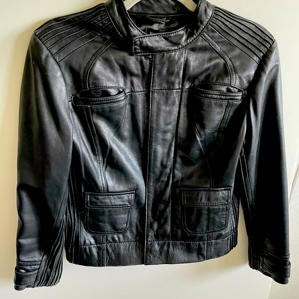 BEBE black leather jacket, Size M, with zipper and buttons, classic